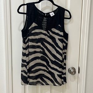 Small Cabi black and grey zebra striped sleeveless blouse.